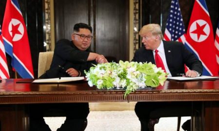 1 Kim y Trump firman documento