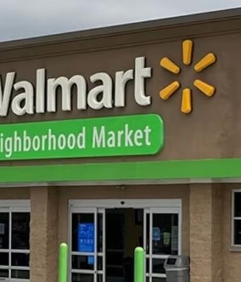 Walmart planea nuevo Neighborhood Market en Vestavia Hills Fachada de una tienda Walmart Neighborhood Market con letras blancas y verdes bajo un fondo marrón y el logo de la marca.