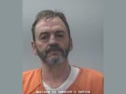 Arresto en Huntsville tras persecución por robo con cuchillo Fotografía de arresto de Jimmy Lewis Price Jr con uniforme naranja en la oficina del sheriff de Madison.