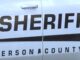 Alabama registra arresto de menor por tiroteo en Center Point Lateral de una patrulla blanca de la Oficina del Alguacil de Jefferson County en Alabama con la palabra Sheriff.