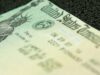 Condenan a 5 años de cárcel por fraude bancario en Alabama Primer plano de un cheque del Tesoro de EE. UU. con la Estatua de la Libertad, usado en fraude en Alabama.
